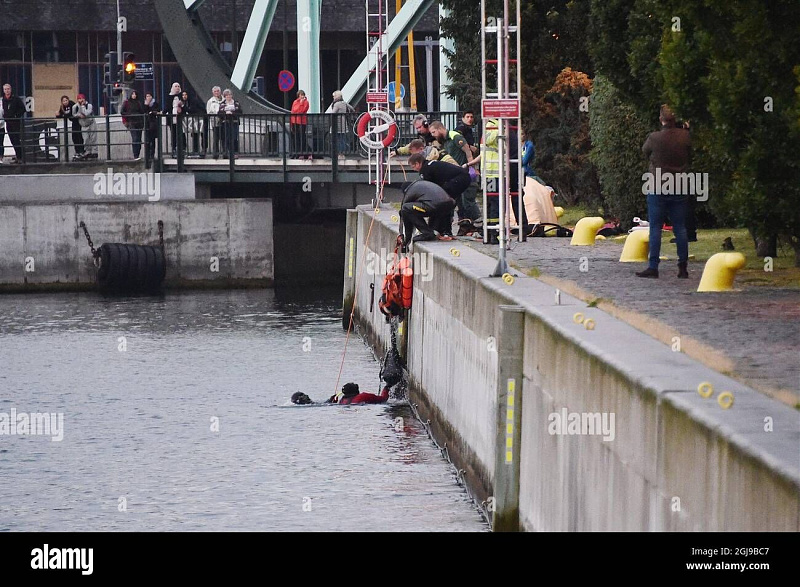 Click image for larger version

Name:	divers-survey-the-scene-after-chris-stokes-from-liverpool-england-saved-a-woman-from-drowning-the-harbour-of-malmo-in-south-sweden-2GJ9BC7.jpg
Views:	195
Size:	199,8 kB
ID:	2103470